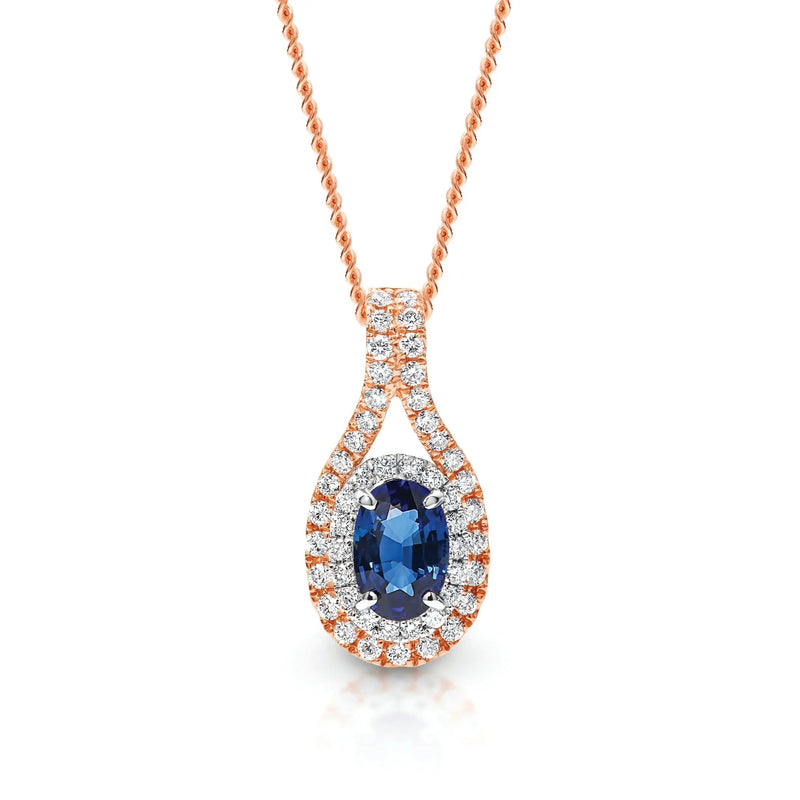 9ct Oval Blue Sapphire and Diamond Halo Pendant