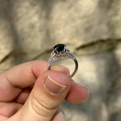 18ct White Gold Dark Blue Sapphire and Diamond Ring