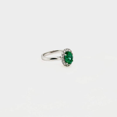 18ct White Gold Emerald and Diamond Halo Ring